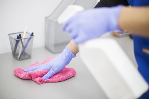 Cleaner starting work with safety awareness and protective equipment